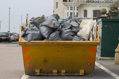 Construction site with waste removal activities in Clapham