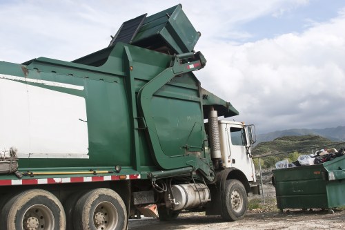 Workers segregating construction waste