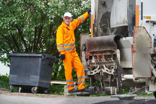 Professional waste removal team at a construction site in Clapham