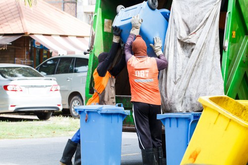 Customers loading items into a Grab Lorry