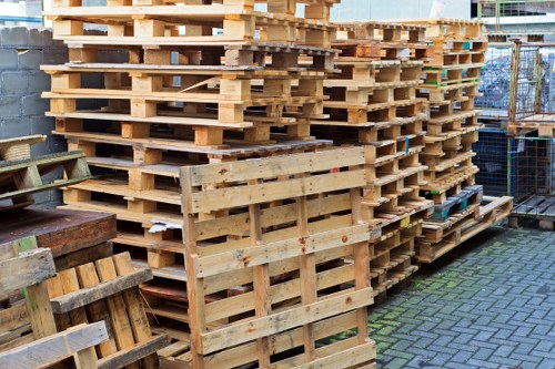 Operative wearing PPE while handling waste materials